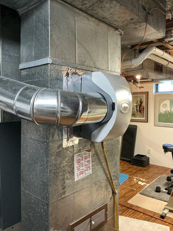 Completed scheduled cooling system maintenance on residential HVAC unit located in basement mechanical area. Performed comprehensive inspection of air handler, ductwork connections, and associated components including copper refrigerant lines and electrical connections. System operational and ready for cooling season demands.