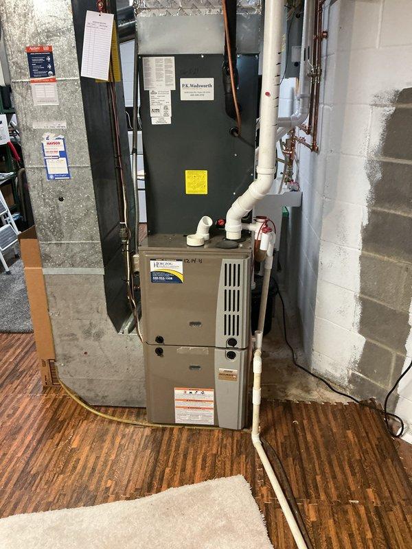 Completed scheduled cooling system maintenance on residential HVAC unit located in basement mechanical area. Performed comprehensive inspection of air handler, ductwork connections, and associated components including copper refrigerant lines and electrical connections. System operational and ready for cooling season demands.