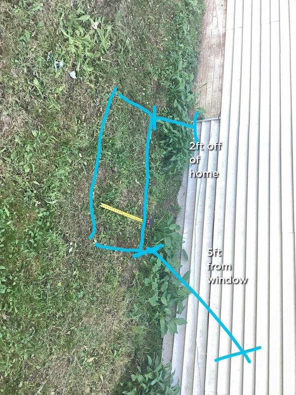 Conducted comprehensive site evaluation for whole home generator installation at residential property. Assessed existing electrical infrastructure including gas meter location and utility connections on exterior wall. Documented optimal generator placement location on side yard, determining proper clearances of 2 feet from home structure and 3 feet from window opening to meet manufacturer specifications and local code requirements. Evaluated existing gas service accessibility and routing options for fuel supply connection. Photographed installation site conditions including foundation area, exterior siding, existing utility penetrations, and surrounding vegetation that may require trimming for proper clearance. Identified suitable location on grassy area adjacent to building with adequate access for equipment delivery and future maintenance. Assessed electrical panel accessibility for transfer switch integration and main service disconnect coordination. Documented site conditions inclu