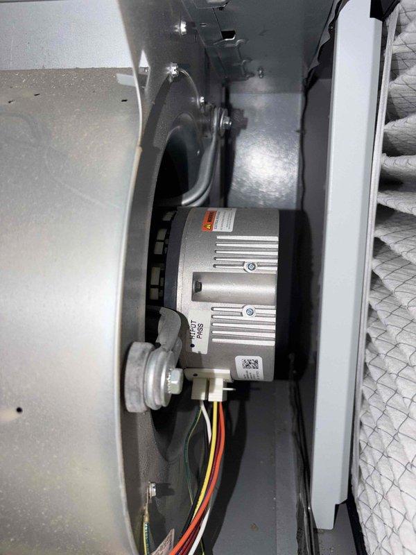 Performed routine cooling system maintenance on ceiling-mounted HVAC unit. Measured supply air temperature at register confirming 57°F output, inspected blower motor assembly and verified proper operation, and checked electrical connections and motor components. All system components found operating within normal parameters with no issues identified.