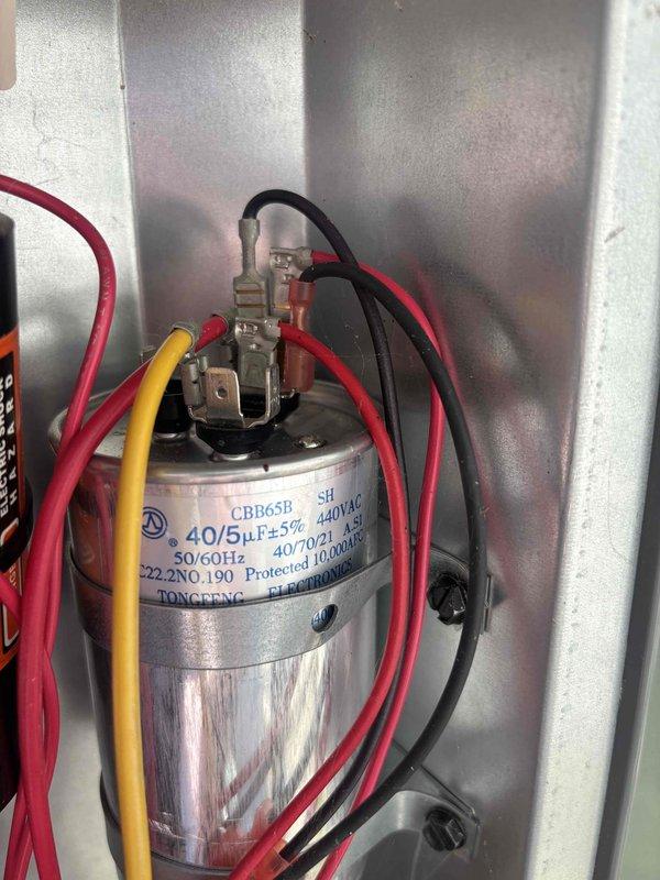 Completed routine cooling system maintenance as part of recurring preventive service agreement. Inspected and documented dual-run capacitor (40/5μF, 440VAC) with proper electrical connections verified on all terminals. System operational and ready for cooling season.