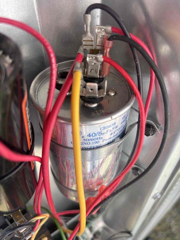 Completed routine cooling system maintenance as part of recurring preventive service agreement. Inspected and documented dual-run capacitor (40/5μF, 440VAC) with proper electrical connections verified on all terminals. System operational and ready for cooling season.