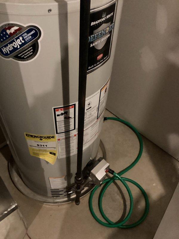 Performed scheduled maintenance on dual tanked water heater system, including complete flush of both the HydroJet and Bradford White Defender units to remove sediment buildup and ensure optimal performance. Inspected all plumbing connections, circulator pump, expansion tank, shutoff valves, and copper piping for proper operation and potential issues, with all components found to be functioning within normal parameters.