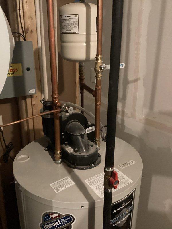 Performed scheduled maintenance on dual tanked water heater system, including complete flush of both the HydroJet and Bradford White Defender units to remove sediment buildup and ensure optimal performance. Inspected all plumbing connections, circulator pump, expansion tank, shutoff valves, and copper piping for proper operation and potential issues, with all components found to be functioning within normal parameters.