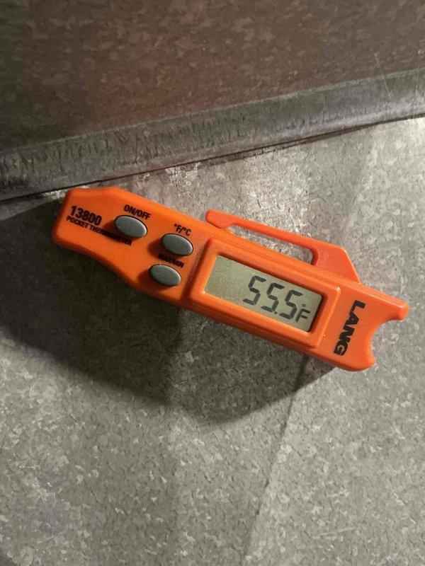 Responded to no cooling complaint for upstairs air conditioning unit. Upon inspection, found extensive condensation on refrigerant line indicating proper cooling cycle operation. Temperature readings confirmed system was achieving target temperatures of 55°F at evaporator coil. Determined airflow issue preventing conditioned air from reaching living space, likely due to closed damper or blocked ductwork in distribution system.