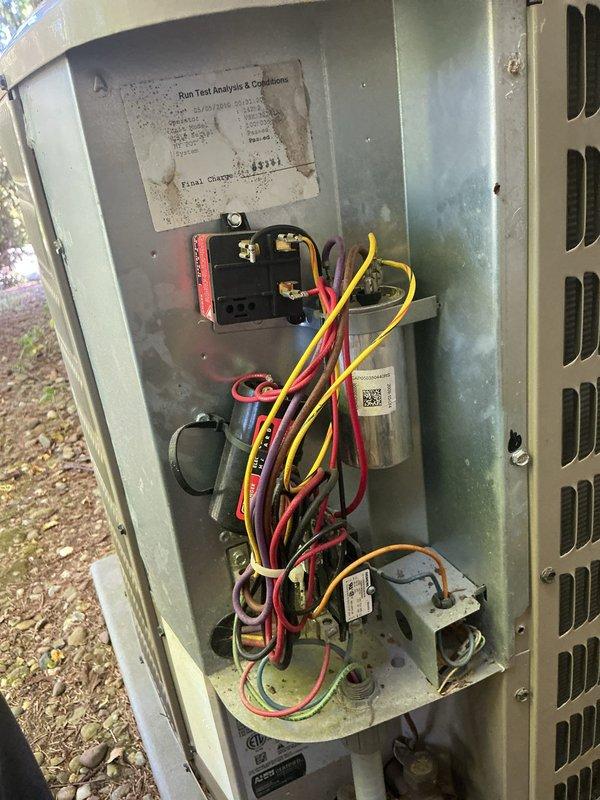 # HVAC Cooling Maintenance - Two Systems

Completed comprehensive preventive maintenance on two outdoor air conditioning units. Performed thorough inspection of electrical components including contactors, capacitors, and control modules on both systems. Verified proper wire connections and routing, checked for signs of wear or deterioration on all electrical contacts and terminals. Inspected CoreSense diagnostic module functionality on one unit. Assessed overall condition of both units' electrical compartments, noting normal weathering consistent with outdoor exposure. All components found operational and systems returned to service in good working condition.