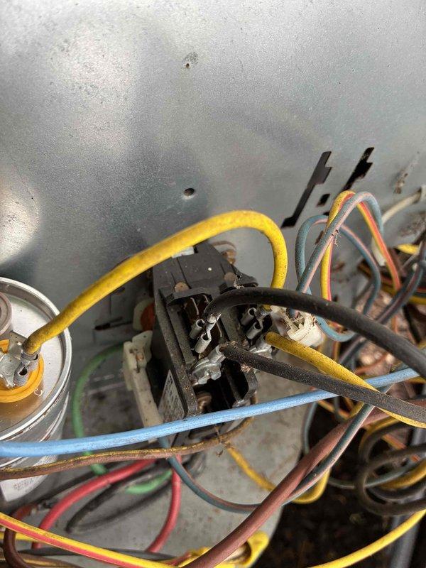 Replaced failed condenser fan motor and dual run capacitor on residential air conditioning unit. Installed new scrubber bulb in air purification system. All electrical connections were properly terminated and secured, system tested and verified operational upon completion.