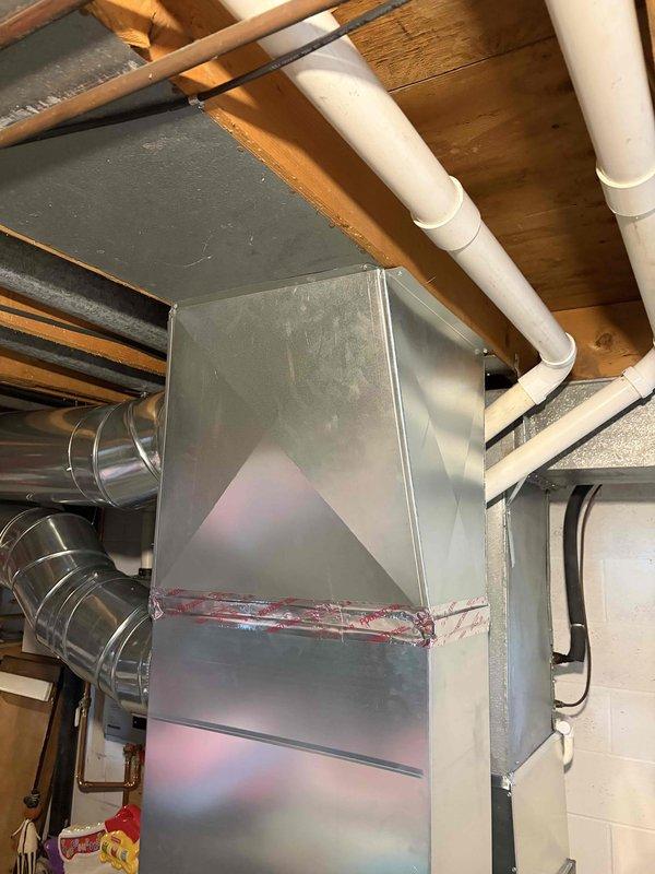 Completed warranty work involving installation of return air pathway and thermostat wiring. Cut in new floor register in hardwood flooring to establish proper return air flow for the HVAC system. Register installed with appropriate metal grille and louvers for optimal air circulation. Verified all ductwork connections at furnace unit are secure and properly sealed. System tested and confirmed operational with adequate airflow through new return pathway.