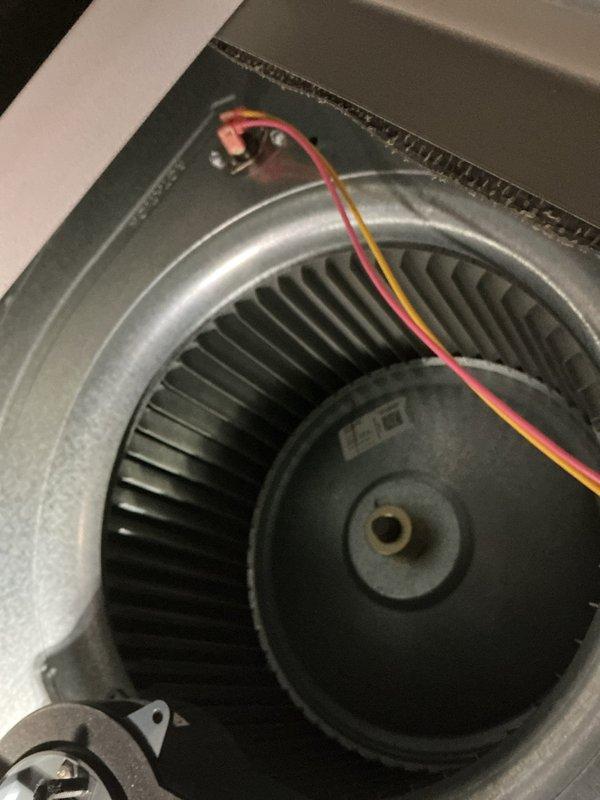 Responded to no cooling call on residential HVAC system. Upon arrival, performed diagnostic evaluation of outdoor condenser unit and indoor air handler components. Inspected blower motor assembly, capacitor, and electrical connections, all of which appeared in good working condition with no visible damage or wear. Examined outdoor condenser unit mounted on pad against exterior brick wall, confirmed unit integrity and proper installation. Troubleshot system to identify root cause of cooling failure and restored system to operational status.