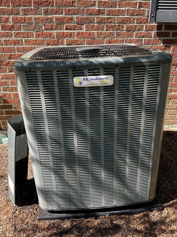 Responded to no cooling call on residential HVAC system. Upon arrival, performed diagnostic evaluation of outdoor condenser unit and indoor air handler components. Inspected blower motor assembly, capacitor, and electrical connections, all of which appeared in good working condition with no visible damage or wear. Examined outdoor condenser unit mounted on pad against exterior brick wall, confirmed unit integrity and proper installation. Troubleshot system to identify root cause of cooling failure and restored system to operational status.