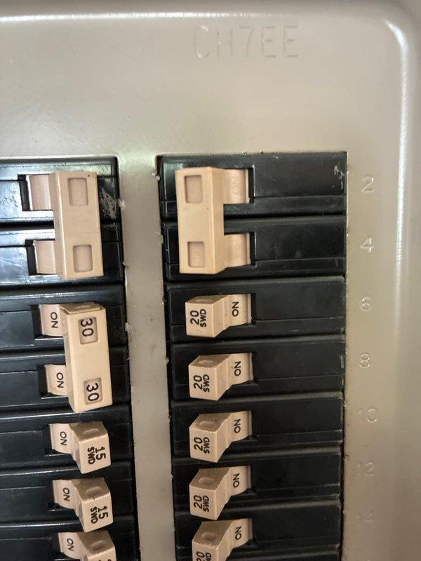Conducted heat pump and air handler replacement estimate for townhome property. Presented three-tier equipment options ranging from 14.3 to 17.2 Nominal SEER and 7.5 to 8.2 HSPF efficiency ratings. Assessed existing electrical infrastructure including circuit breaker panel with 20A and 30A breakers, and documented current add-on heat pump system installation with associated electrical connections and conduit routing.