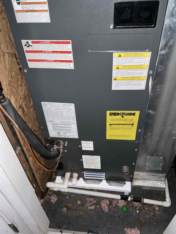 Completed HVAC estimate for heat pump and air conditioning system replacement at rental property. Evaluated existing CAPTA4230C3A heat pump air handler unit with accessible installation location in utility space, documented current system configuration including condensate drainage piping and electrical connections, and created equipment layout diagram showing proposed replacement options for property owner review.
