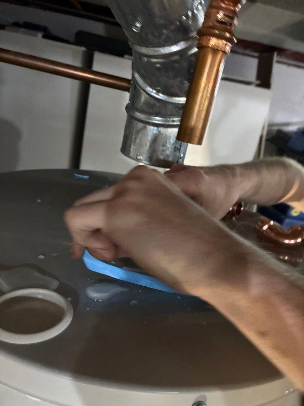Completed warranty replacement of residential water heater by removing the existing failed unit and transporting it to the supplier for warranty processing. Installed new water heater with proper copper piping connections, pressure relief valve, and supply line fittings, ensuring all connections were properly tightened and sealed to code specifications.