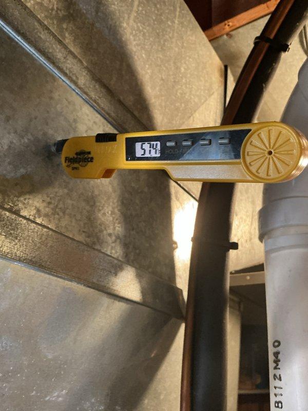Completed routine cooling maintenance on residential HVAC system. Inspected furnace unit, ductwork, and ventilation components, verified proper airflow readings using digital anemometer showing 574 CFM at supply register, and confirmed all equipment operating within normal parameters. System tested and left in proper working condition with no deficiencies noted.