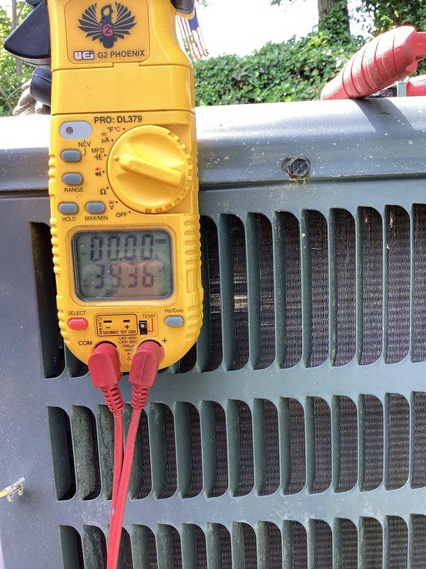 Completed scheduled preventive maintenance on residential air conditioning system. Performed comprehensive inspection of outdoor condensing unit, including visual assessment of cabinet condition, refrigerant line connections, and electrical components. Conducted electrical diagnostics using digital multimeter to verify proper voltage and amperage readings, with measurements indicating normal operating parameters at 33.30 on tested circuit. System operating within manufacturer specifications with no deficiencies noted requiring immediate attention.