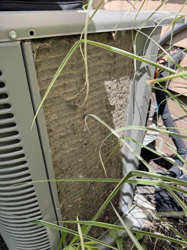 Completed cooling tune-up on residential HVAC system, including inspection of indoor air handler and outdoor condensing unit. Inspected air filter with pleated media in proper working condition, verified outdoor unit operation despite accumulated debris and vegetation growth around equipment, and documented overall system condition. Customer declined electrical inspection services.