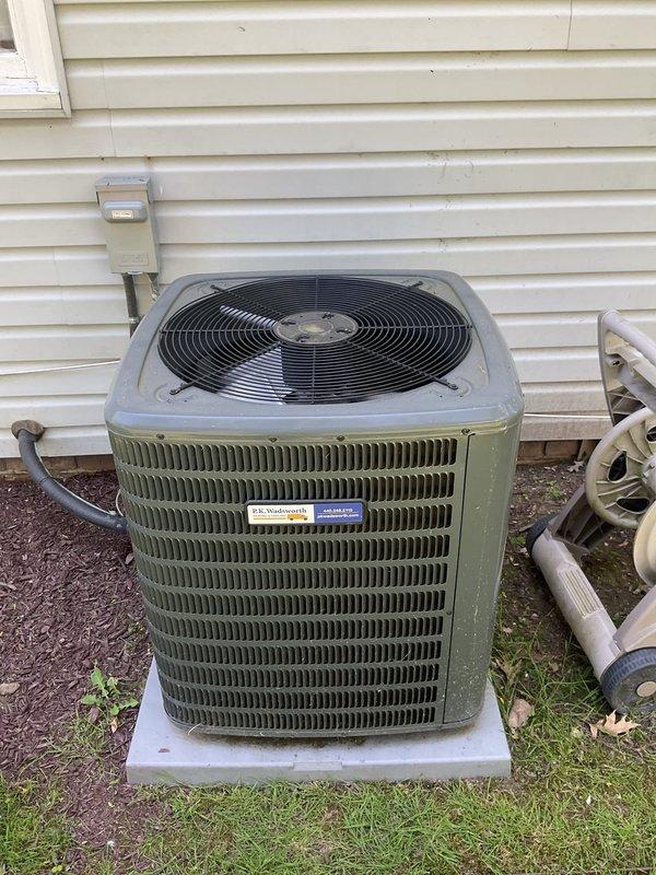 Completed cooling system maintenance on residential HVAC unit. Performed standard tune-up procedures including inspection of outdoor condenser unit, verification of supply air temperatures at register, and assessment of ductwork insulation integrity. All components found operating within normal parameters with supply air temperature reading 48.5°F, indicating proper cooling performance.