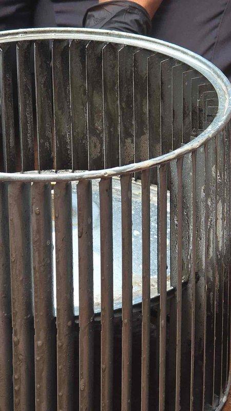 Performed blower wheel cleaning service on HVAC system. Removed heavily soiled blower wheel assembly showing significant accumulation of dust, dirt, and debris on metal blades and interior surfaces. Thoroughly cleaned all components and reinstalled unit to restore proper airflow and system efficiency.