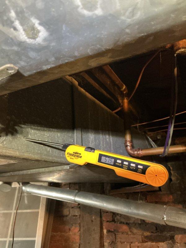 Responded to no cooling call where system would not turn on. Upon arrival, inspected outdoor condensing unit and found equipment in good physical condition with clean fan blades and operational grille. Verified indoor evaporator coil temperatures reading 59.9°F, indicating system was not operating in cooling mode. Diagnosed electrical issue preventing unit startup and restored power to system, confirming proper operation of condenser fan motor and compressor before departure.
