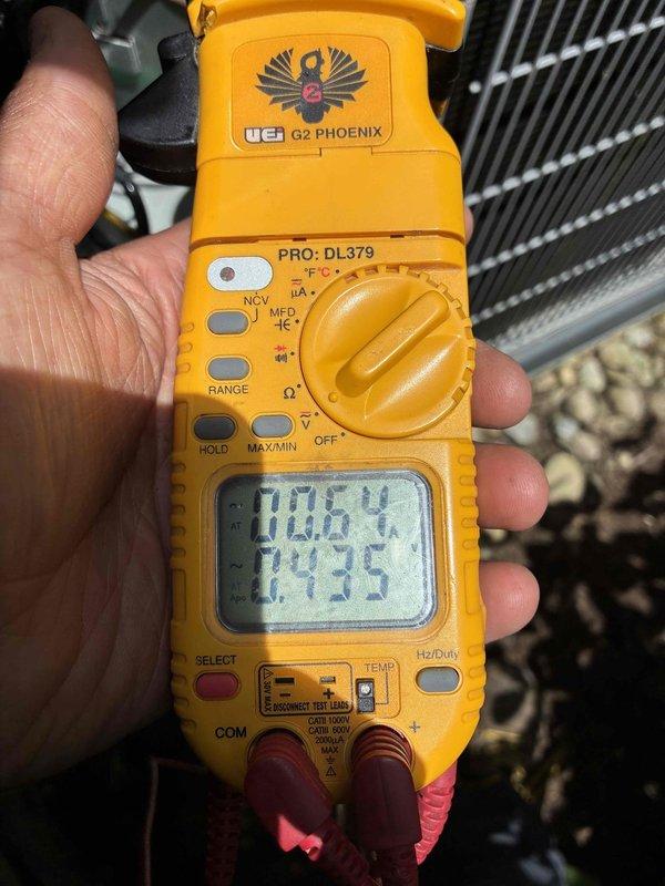 Responded to no cooling complaint two days after routine maintenance. Upon inspection, discovered severe electrical failure in outdoor unit with catastrophic capacitor failure and fire damage to control compartment. Interior of electrical housing showed extensive burn marks, soot deposits, and charred components with melted material throughout upper section of compartment. Verified voltage readings at 110.5V and measured system parameters. Equipment sustained significant electrical damage requiring component replacement to restore cooling operation.