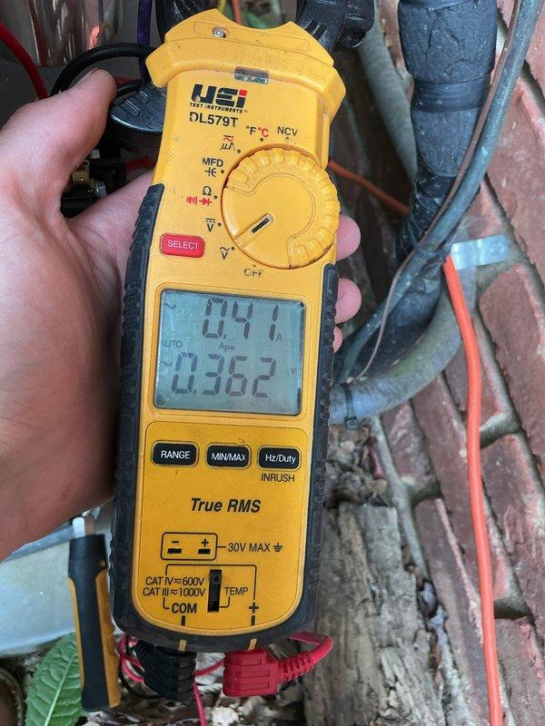 Completed cooling system tune-up and performance verification. Measured compressor amperage at 0.4A and recorded superheat reading of 499.7°F using calibrated digital multimeter. Inspected refrigerant lines, electrical connections, and verified system operation within manufacturer specifications.