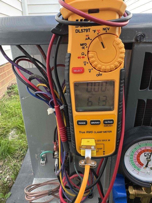 Completed comprehensive cooling tune-up on two HVAC systems, performing standard maintenance procedures including electrical diagnostics with amp readings, refrigerant pressure verification, and inspection of mechanical components. Observed corrosion on pipe fittings in utility area and documented system operating parameters; both units operating within normal specifications at time of service.
