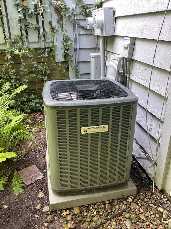 Completed scheduled cooling system maintenance on residential HVAC system. Performed comprehensive inspection of outdoor condensing unit, including assessment of refrigerant lines, electrical connections, and condenser coil condition. Verified proper operation of fan assembly and checked electrical disconnect box for secure connections. Inspected indoor components including Aprilaire 600 Series humidifier mounted to ductwork system. All equipment found operating within normal parameters with no immediate service needs identified.