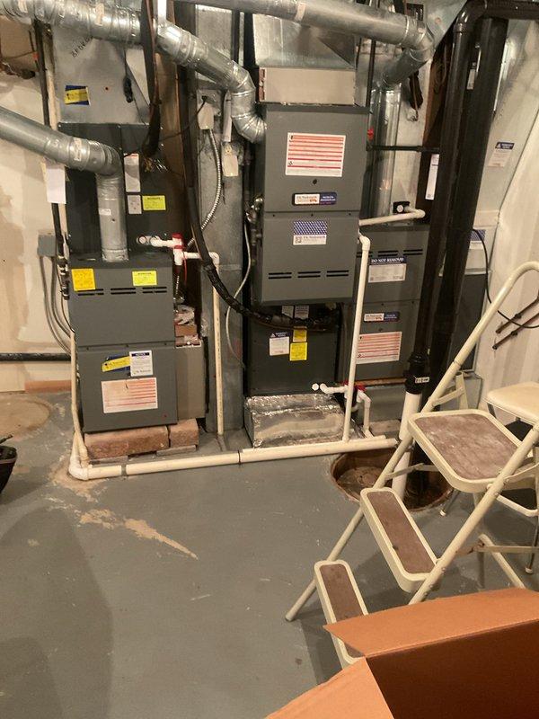 Completed scheduled cooling maintenance on multiple HVAC systems in basement mechanical room as part of ongoing preventive maintenance program. Performed comprehensive inspection and servicing of air handler units, including filter replacement, ductwork examination, and system performance verification. All equipment found operating within normal parameters with clean filters installed and proper airflow confirmed throughout the system.