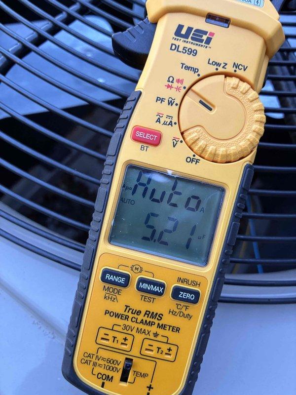Completed scheduled cooling system maintenance visit on residential air conditioning unit. Performed comprehensive electrical diagnostics using digital clamp meter, measuring system amperage at 170.0A and capacitance reading of 52.1 μF to verify proper compressor and condenser operation. Customer declined optional electrical inspection services. All equipment operating within normal parameters at time of service.