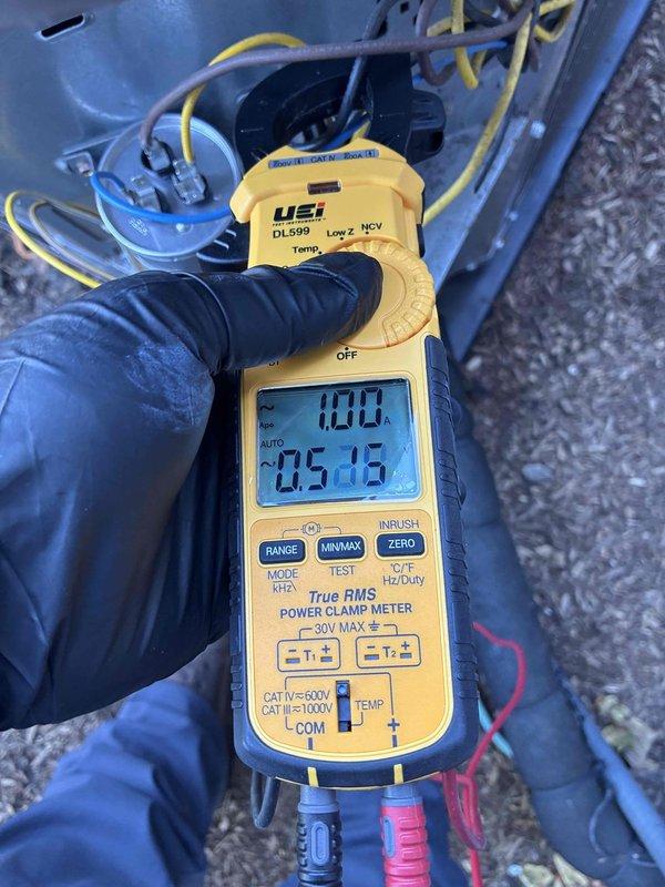 Completed scheduled cooling system maintenance visit on residential air conditioning unit. Performed comprehensive electrical diagnostics using digital clamp meter, measuring system amperage at 170.0A and capacitance reading of 52.1 μF to verify proper compressor and condenser operation. Customer declined optional electrical inspection services. All equipment operating within normal parameters at time of service.