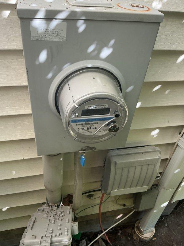 Completed comprehensive whole-home electrical inspection examining both exterior service entrance and interior distribution systems. Documented main utility meter installation, service entrance conductors, grounding connections, and weatherhead components at exterior meter base. Inspected main electrical panel, circuit breaker configuration, wire routing, and conductor terminations throughout the dwelling. All findings photographed for record-keeping and future reference.