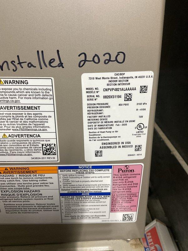 # HVAC Cooling Maintenance Summary

Completed routine preventive maintenance on a Carrier CNPVP4821ALA4A4A air conditioning unit manufactured in February 2020. System utilizes R-410A refrigerant and operates at 450 PSIG design pressure. Performed comprehensive inspection of outdoor condenser unit, verified all warning and safety labels were intact and legible. Conducted temperature differential measurements across the evaporator coil, recording supply air temperature of 42°F, indicating proper cooling performance. Inspected ductwork installation in mechanical space, confirmed secure mounting and proper insulation. All system components operating within normal parameters with no deficiencies noted.