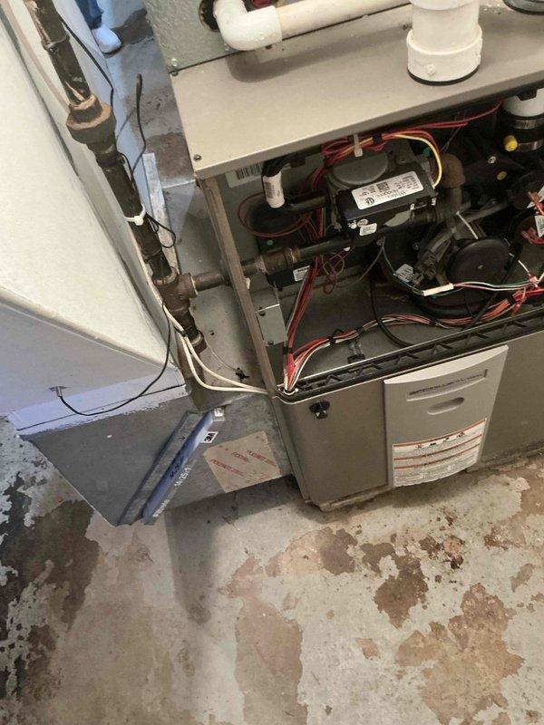 Performed diagnostic evaluation on residential HVAC system experiencing no cooling condition. Conducted comprehensive assessment of air handler and associated components including blower motor, electrical connections, capacitor, and control modules. Documented internal system condition and provided equipment replacement options to address cooling failure.