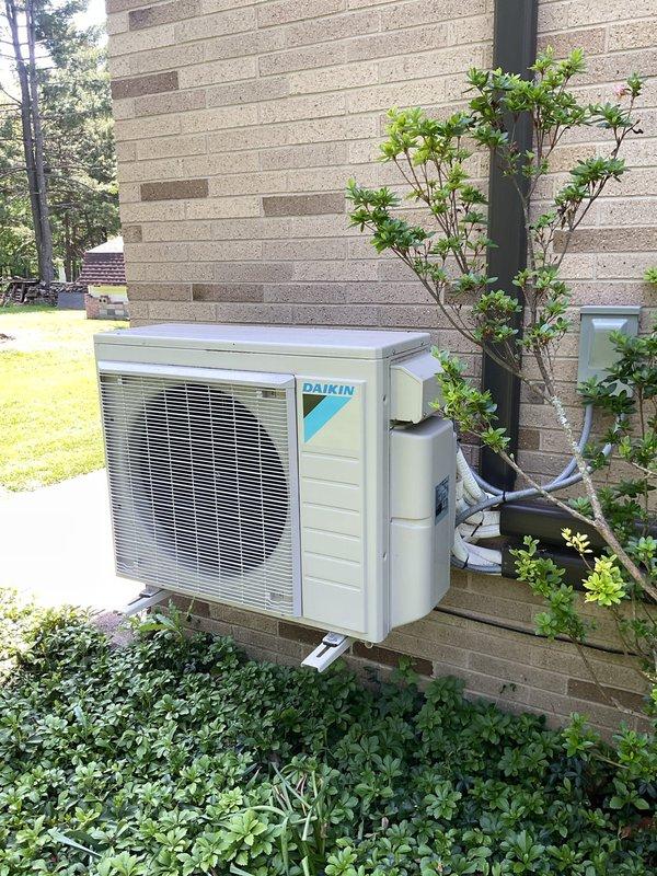 Performed comprehensive cooling maintenance on Daikin heat pump system, including inspection of outdoor condenser unit, electrical connections, and refrigerant lines. All components found operating within normal parameters; noted vegetation growth near unit that should be trimmed to maintain proper airflow clearance.