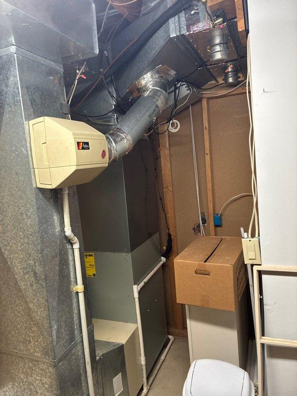 Completed on-site evaluation of existing HVAC system in basement utility area and provided furnace replacement options to homeowner. Assessed current equipment configuration including furnace/air handler unit, ductwork layout, and refrigerant line routing. Created property sketch documenting equipment location and access points for future installation planning.