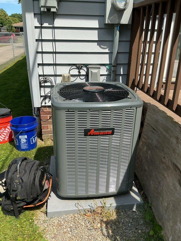 Completed scheduled cooling maintenance on residential Amana air conditioning system. Performed comprehensive inspection of outdoor condensing unit, checked electrical connections and conduit, verified proper unit operation, and cleaned ventilation components that showed accumulation of dust and debris. System tested and confirmed operating within normal parameters.