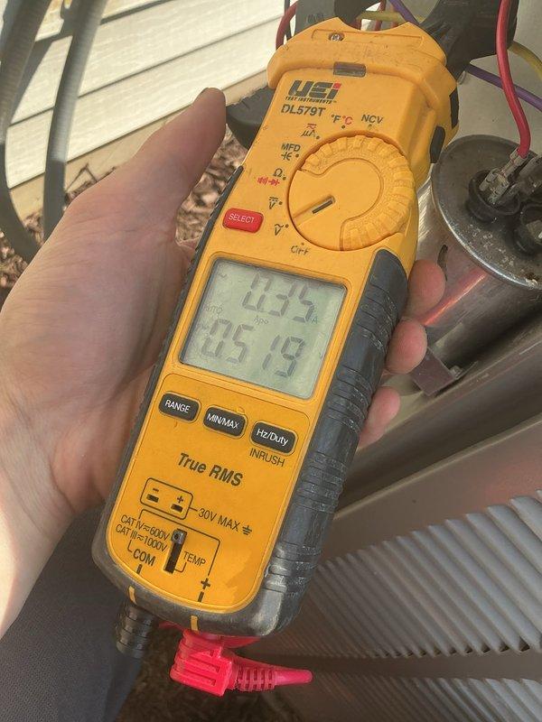 Performed routine cooling system maintenance on residential HVAC unit. Conducted electrical diagnostics using digital multimeter to verify proper voltage and amperage readings at the outdoor condensing unit, tested capacitor performance, and inspected all electrical connections and components for proper operation. Verified disconnect box functionality and confirmed system is operating within manufacturer specifications.
