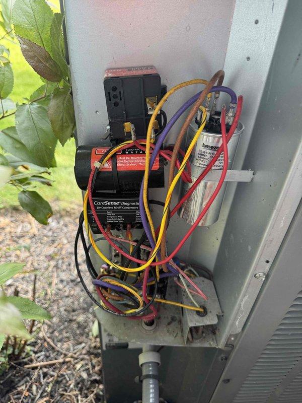 Responded to service call for air conditioning unit experiencing short cycling issues. Upon arrival, performed diagnostic testing on outdoor condensing unit using CoreSense diagnostic equipment. Conducted electrical testing of capacitor and associated components with multimeter leads to identify cause of intermittent operation. Inspected indoor furnace and air handler equipment in basement for proper airflow and electrical connections. Completed system evaluation and addressed the short cycling concern to restore normal AC operation.