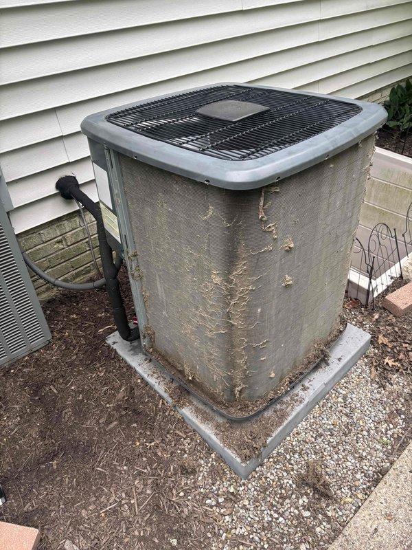 # HVAC Cooling Maintenance Summary

Completed scheduled preventive maintenance on residential air conditioning system. Performed electrical diagnostics using digital clamp meter to verify proper amperage draw and system performance. Inspected outdoor condenser unit, noting significant weathering and coating deterioration on cabinet exterior from extended outdoor exposure. All electrical connections tested and confirmed operational. System operating within normal parameters upon completion of maintenance visit.

---

## Detailed Service Report

Performed comprehensive cooling season maintenance on residential HVAC system as part of ongoing preventive maintenance program. Service included thorough inspection and testing of outdoor condensing unit and associated electrical components.

**Electrical Testing and Diagnostics:**
Utilized digital clamp meter to measure and verify electrical performance parameters. Conducted amperage readings on compressor and condenser fan motor circuits to en