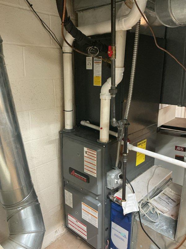 Completed comprehensive preventive maintenance on two residential air conditioning systems. Performed system diagnostics using digital multimeter to verify proper electrical values and control voltage readings at 24.5V, confirming normal operation of both HVAC units. Inspected furnace/air handler components, ductwork connections, refrigerant lines, and condensate drainage systems with all equipment found to be in operational condition.