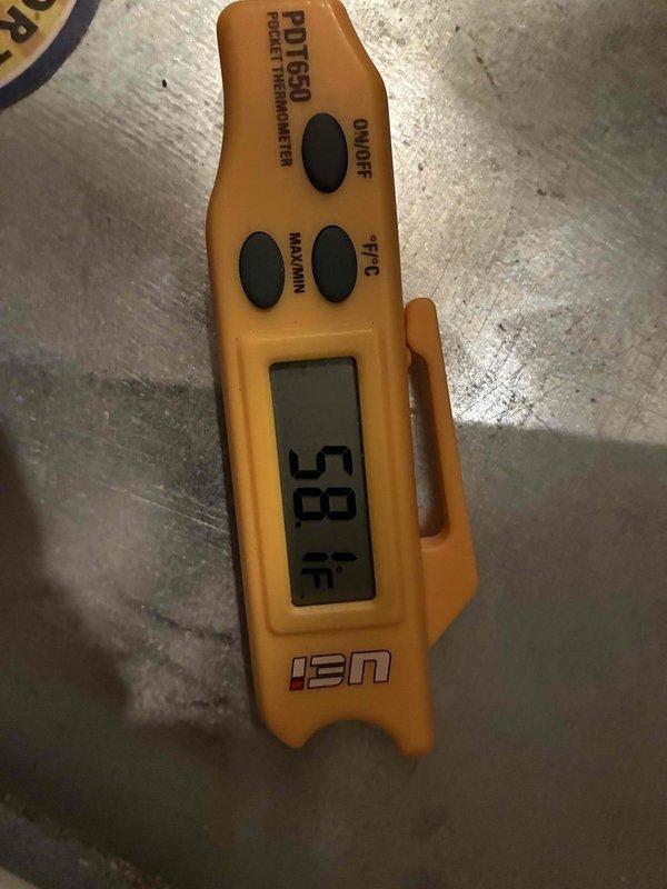 Completed cooling system tune-up and inspection on residential HVAC unit. Customer reported deteriorated insulation covering on refrigerant line set between outdoor condenser and building exterior; observed and documented damaged line set insulation requiring replacement. Recorded supply air temperature of 58°F during system operation.
