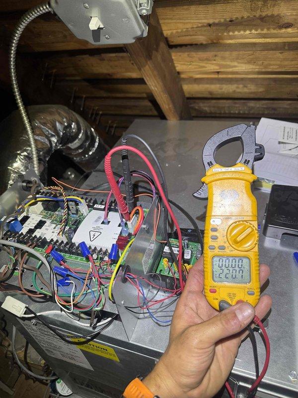 Responded to no cooling call where condenser unit was not operating. Upon arrival, performed diagnostic testing on outdoor unit's electrical components using digital clamp meter. Inspected control board, capacitor, and contactor connections in both indoor air handler and outdoor condensing unit. Verified proper voltage readings and tested electrical connections throughout the system. Identified and resolved issue preventing condenser operation. System restored to normal cooling function and confirmed proper operation before departure.
