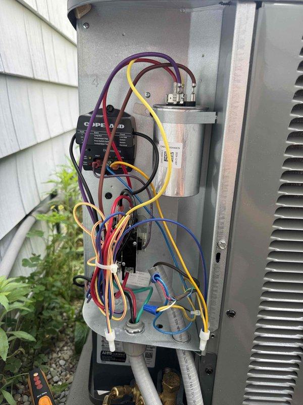 Responded to no cooling call where condenser unit was not operating. Upon arrival, performed diagnostic testing on outdoor unit's electrical components using digital clamp meter. Inspected control board, capacitor, and contactor connections in both indoor air handler and outdoor condensing unit. Verified proper voltage readings and tested electrical connections throughout the system. Identified and resolved issue preventing condenser operation. System restored to normal cooling function and confirmed proper operation before departure.
