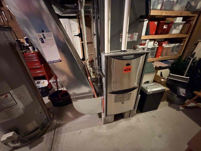 Responded to no cooling complaint on residential HVAC system. Upon arrival, performed diagnostic evaluation of the unit and documented system readings with digital measuring instrument showing 13.24 on display. Completed standard troubleshooting procedures to identify cause of cooling failure and recorded findings on equipment service log for future reference.