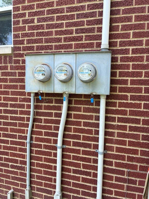 Conducted on-site evaluation to provide air conditioning replacement options for the property. Documented existing electrical service configuration and exterior building conditions to assess installation requirements for new HVAC equipment.