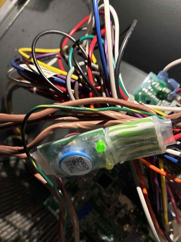 Returned to complete repair work on air conditioning unit. Replaced failed contactor and installed two surge protectors to provide electrical protection for the system. Unit was reported as noisy but remained operational throughout the service call. All electrical connections were properly secured and tested for functionality upon completion.