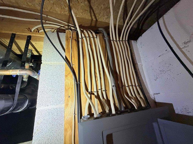 # HVAC Service Call - No Cooling Complaint

Responded to no cooling complaint on 35-year-old residential HVAC system. Upon arrival, performed visual inspection of basement-installed furnace and air handler unit with associated ductwork and refrigerant lines. Documented existing equipment condition through photographs showing aged system with metallic ductwork, copper refrigerant piping, and overall installation layout.

Given the advanced age of the system (35 years) and customer's request for repair estimate if fixable, assessed equipment for viability of repair versus replacement. Standard residential HVAC systems have typical service life of 15-20 years, making this unit well beyond expected operational lifespan. Evaluated system components including air handler, ductwork connections, refrigerant line routing, and overall mechanical condition.

Provided customer with professional assessment of system status and prepared replacement estimate as requested due to age-related concerns a