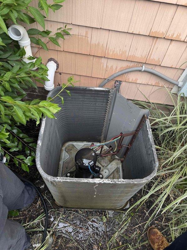 Performed comprehensive coil cleaning service on residential outdoor condensing unit, removing debris and buildup from condenser coil fins to restore optimal heat transfer efficiency and airflow. Installed hard start capacitor (compressor saver) to assist compressor motor during startup, reducing electrical draw and extending equipment lifespan. Unit tested and confirmed operational following service completion.