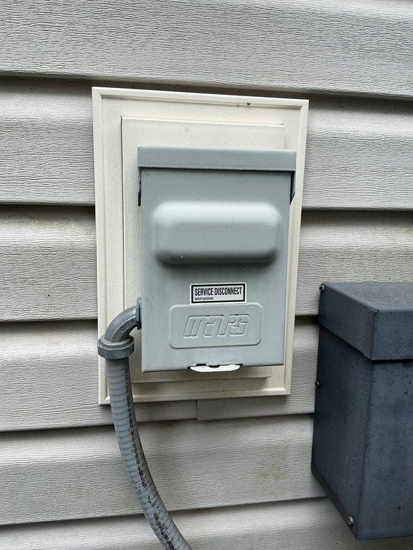 Completed scheduled preventive maintenance on residential cooling system. Inspected exterior electrical disconnect box and service receptacle, confirming proper operation and accessibility of all electrical components. All equipment found in normal operating condition with no deficiencies noted.
