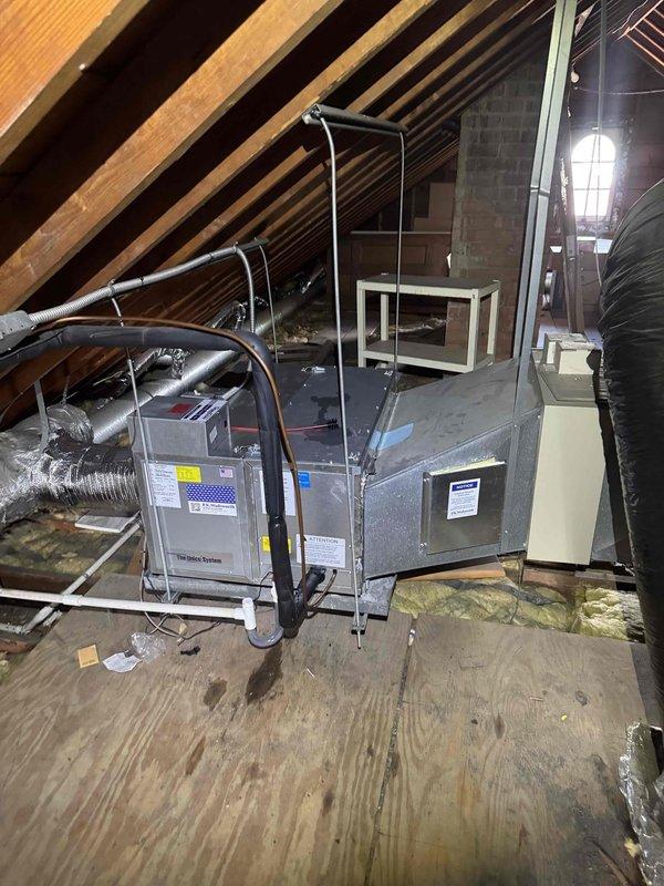 Responded to no cooling complaint for upstairs zone. Inspected Unico CX high-velocity air conditioning system serving second floor. Evaluated outdoor condensing unit and attic-mounted air handler with associated ductwork. Determined retrofit Unico CX equipment requires specialized parts currently on backorder. System remains non-operational pending availability of necessary components for repair.
